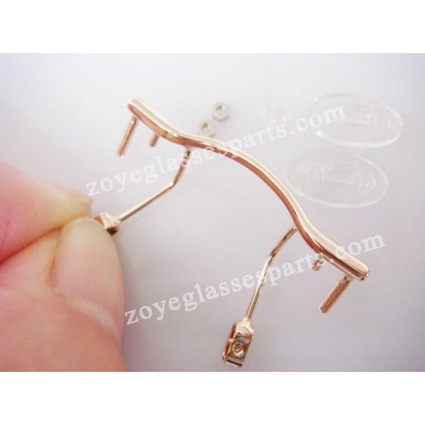 screw on bridge for rimless eyewear with nose pads ZOYE Eyeglass Parts Co. ltd